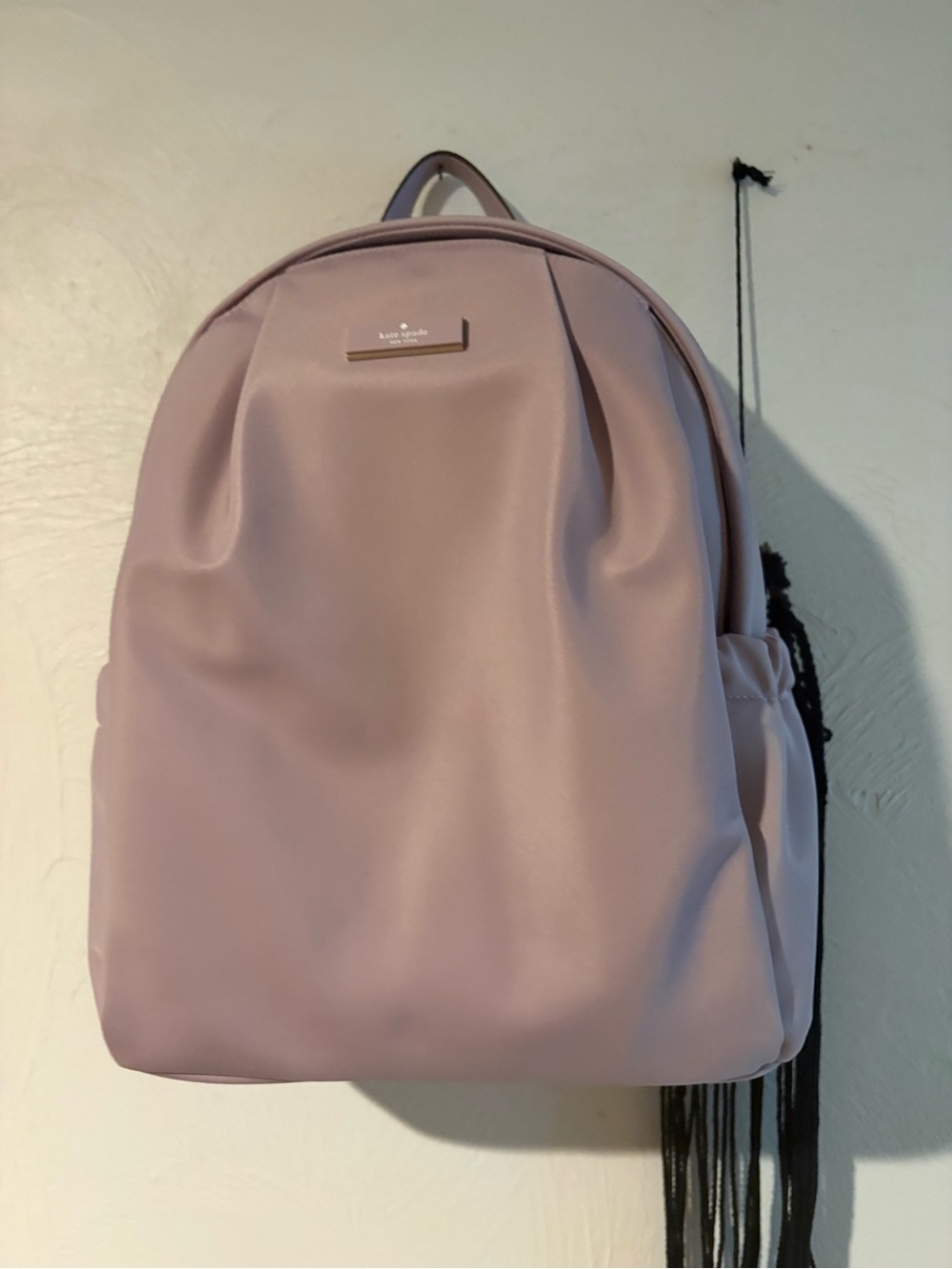 kate spade light lavender Carter style backpack with logo plaque